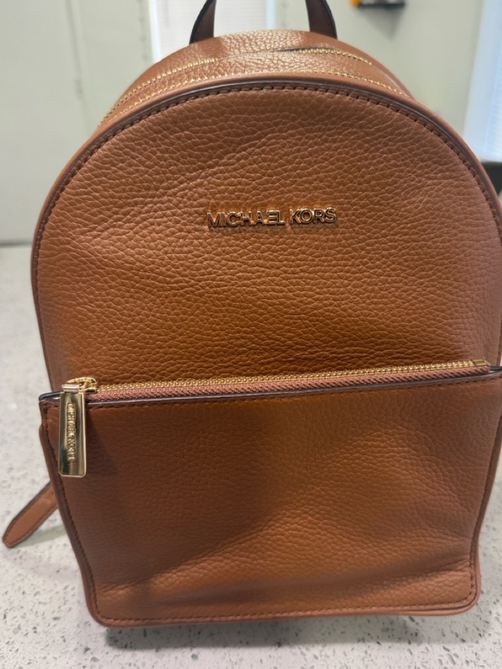 Michael Kors Cognac Pebbled Leather Mini Backpack